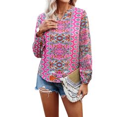 Bright Pink Graphic V-Neck Blouse Relaxed Top Long Puff Sleeves Sizes S-Xl Loose Fit. Unique Multi Color Graphics. Pink, Blue, Rust This Stylish Top Features A Chic V-Neck And Long Puff Sleeves, Creating A Trendy And Flattering Silhouette. The Unique Graphic Print Adds A Touch Of Individuality To Its Relaxed Fit, Making It Perfect For Casual Outings, Lounging At Home, Or Stylishly Running Errands. This Top Ensures Comfort And Style With Its Loose Fit And Playful Puff Sleeves. Get Ready To Relax Pink Floral Print Blouse With Split Neck, Pink Floral Print Split Neck Blouse, Pink Split Neck Blouse With Floral Print, Casual Pink Tops With Split Neck, Summer Split Neck Pink Blouse, Pink V-neck Blouse For Spring, Spring V-neck Pink Blouse, Pink Bohemian Top, Pink Floral Print V-neck Blouse