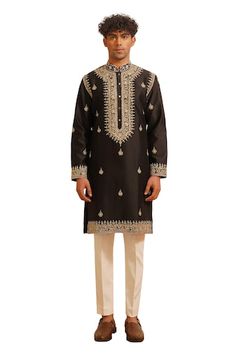 Black kurta with thread embroidered blossom motifs embellished by sequins and pearls. Comes with pant. - Aza Fashions Traditional Wear With Resham Embroidery And Traditional Drape, Black Chanderi Churidar With Embroidered Border, Chanderi Churidar With Embroidered Border In Black, Designer Chanderi Sherwani With Embroidered Border, Ceremonial Churidar With Embroidered Border For Transitional Season, Ceremonial Chanderi Kurta With Embroidered Border, Festive Kurta With Embroidered Border And Traditional Fit, Chanderi Kurta With Embroidered Border For Ceremonial Occasions, Traditional Black Sherwani With Floral Embroidery