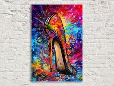 a painting of a high heeled shoe with colorful paint splatters on it