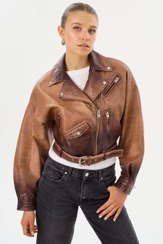 Sometimes, there's no better feeling than commanding the room. Bring back the best of the 80s with this vintage-inspired cropped leather jacket. Featuring classic biker elements and unexpected stand-outs like shoulder pads and balloon pleated sleeves, you'll stand out from the rest when you rock the Dylan. A coin flap pocket and a removable waist belt add unique touches to this lamb leather stunner. A true statement piece, this 80s leather jacket is an instant head-turner. 70s Leather Jacket Outfit, 70s Leather Jacket, Cropped Leather Jacket, Leather Jacket Outfits, Pleated Sleeves, Leather Biker Jacket, You Rock, Swim Accessories, The 80s