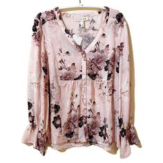 Chic And Sophisticated Women’s Floral Chiffon “Tanzania” Blouse From Emaline. Perfect To Wear Out To Dinner Or At Work In The Office. Minimal Wear! - Allover Pink Champagne Color With Darker Pink Floral Pattern - 3/4-Length Sleeves - Flowy, Flattering Fit - V Neckline - Button-Down Front - Elastic Ruffled Sleeve Cuffs - Slightly Sheer - Chiffon Fabric Feminine 3/4 Sleeve Blouse For Daywear, Feminine 3/4 Sleeve Tops For Day Out, Spring 3/4 Sleeve Blouse For Daywear, Feminine Tops With 3/4 Sleeves, Chic Blouse With 3/4 Sleeves For Brunch, Feminine Bell Sleeve Blouse For Fall, Spring Daywear Blouse With 3/4 Sleeves, Feminine Fall Blouse For Brunch, Feminine Blouse For Fall Brunch