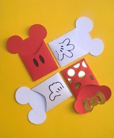 mickey mouse cut out from pieces of paper