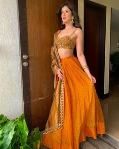 sonam kapoor's sister shanaya in a lehenga Bollywood Celebrities In Lehenga, Diwali Fits, Shanaya Kapoor, Orang India, Orange Lehenga, Color Knowledge, Desi Fits, Haldi Outfits, Lehenga Design