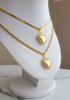 Stainless Steel 18k Gold Plated *Cuban Chain: Length : 19 inches Thickness : 4mm *Snake bone chain: 16 + 2 cm (adjustable) Thickness: 3mm The Love Captured Pendant is the perfect way to keep your loved one close to your heart. Featuring a heart-shaped photo locket, this necklace allows you to DIY your photo for a personalized touch. With this photo locket, you can capture and cherish your love forever. *Photos not included. Luxury Rings, Photo Locket, Love Forever, Cuban Chain, Mens Wedding Rings, Ring Collections, Your Photo, Ring Bracelet, Men's Collection