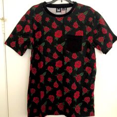 This Is A Brand New Tee Shirt That Has Never Been Worn Before Rose Print Crew Neck Top For Streetwear, Black Crew Neck T-shirt With Rose Print, Black Cotton T-shirt With Rose Print, Black Short Sleeve T-shirt With Rose Print, Black Rose Print Short Sleeve T-shirt, Black Cotton Tops With Rose Print, Trendy Black Top With Rose Print, Casual Rose Print Crew Neck T-shirt, Black Floral Print Tops For Streetwear