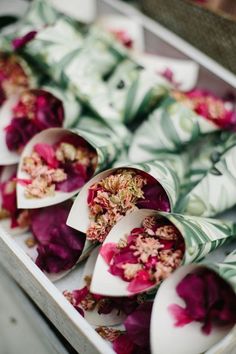 flowers are wrapped in paper and ready to be used as teas or desserts