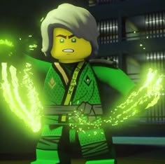 the lego movie character has green lights in his hands