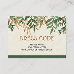 a business card for dress code with green leaves on the front and white back,