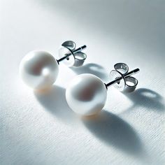 Elevate your jewelry collection with Bella Leora's Hand-Picked Freshwater Pearl Earrings from Urban Sombrero's Bella Leora jewelry line. Crafted with naturally sourced, genuine freshwater pearls and 14k gold, these earrings offer exceptional quality and elegance. Our 7.0-7.5mm pearls are carefully hand-selected to ensure only the highest quality gems with deep luster make their way into your jewelry box. These 14k gold stud earrings are not only beautiful but also nickel-free and hypoallergenic, Hypoallergenic Round White Gold Pearl Earrings, White Hypoallergenic Round Pearl Earrings, Elegant White Pearl Earrings, Tarnish Resistant, Nickel-free Yellow Gold Round Pearl Earrings, Hypoallergenic 14k Gold-filled Round Pearl Earrings, White Gold Stud Earrings, Cultured Stone, White Gold Studs, Earring Trends