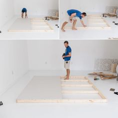 two men working on the floor in a room with white walls and wooden steps, while another man is using a screwdriver