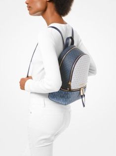 Laid-back yet luxe our Rhea backpack redefines big-city accessorizing. We love the combination of color-blocked logo print twill and polished hardware. With its multiple zipper pockets and delicate shoulder straps it’s a stylish update to the enduring design. Sling Backpack, Zipper Pocket, Fashion Backpack, Color Block, Zip Pockets, Dust Bag, Michael Kors, Backpacks, Handbags