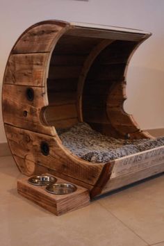 a dog bed made out of wood and metal