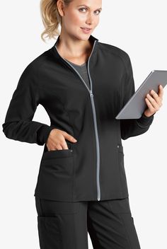 The perfect way to warm things up at work or off the clock (it’s that comfy!). Our raglan sleeve scrub jacket is tailored for the best fit in our signature soft fabric. Four pockets total. Easy Stretch scrub collection is designed for a modern look and easy fit for very long shifts and made with performance 4-way stretch comfort fabric. • Classic fit • Mockneck • Zip front • Rib knit cuffs • Total of 4 pockets • 2 front double pockets • Raglan long sleeve • Front and back princess seams • Approx Stretch Long Sleeve Track Jacket With Pockets, Functional Stretch Outerwear With Pockets, Fitted Functional Track Jacket With Pockets, Black Fleece Jacket With Pockets For Work, Functional Long Sleeve Track Jacket With Pockets, Casual Stretch Track Jacket For Work, Functional Fall Track Jacket For Workwear, Black Track Jacket With Side Pockets, Long Sleeve Track Jacket With Pockets For Work