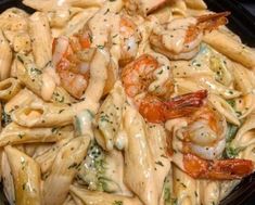 pasta with shrimp and sauce in a pan