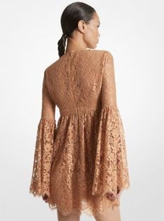 Capture the essence of ‘60s-inspired dressing in this floral lace mini dress, which debuted on the Spring/Summer 2024 runway. Dramatic bell sleeves, an empire waist and a plunging neckline combine to create an ultra-feminine silhouette. Lean into the bohemian aesthetic with dainty sandals and a bucket bag to complete the look. Spring Evening Dress With Scalloped Lace, Knee-length Lace Mini Dress For Cocktail, Spring Evening Lace Dress With Scalloped Lace, Fitted Mini Dress With Lace Sleeves For Spring, Knee-length Spring Dress With Lace Sleeves, Spring Knee-length Dress With Lace Sleeves, Knee-length Lace Mini Dress For Fall, Scalloped Lace Mini Dress For Spring Party, Lace Knee-length Mini Dress For Fall