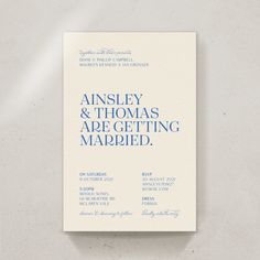 the front and back cover of an elegant wedding card, with blue ink on white paper