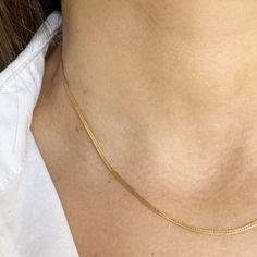 The Herringbone Essential Chain is a true classic with its bent metal pieces forming a herringbone pattern. A delicate shimmer and feminine feel, make this necklace a must have for any jewelry collection. - 16-18 inches & super versatile. 18 inches is a true classic length or wear it closer to 16 inches for a shorter style, sitting closer to the base of the neck. - all pieces are 14K Gold filled (For more information on our metals click HERE!) Classic Herringbone Snake Chain Necklace, Elegant Everyday Herringbone Necklace With Snake Chain, Elegant Everyday Herringbone Snake Chain Necklace, Everyday Herringbone Delicate Chain Choker, Classic Herringbone Link Necklace, Delicate Chain Herringbone Necklace As Gift, Elegant Herringbone Necklace With Adjustable Snake Chain, Classic Herringbone Necklace With Clavicle Chain For Everyday, Classic Gold Herringbone Necklace With Delicate Chain