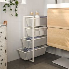 the bathroom is clean and ready to be used as a storage area for toiletries