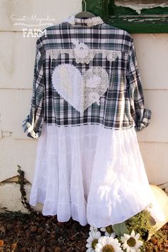 a white and black plaid shirt with a heart on it