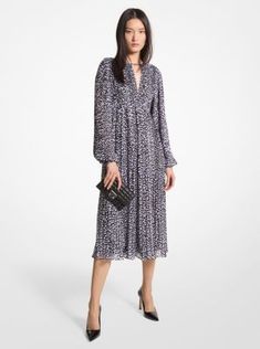 For daytime events, work functions and everything in between, this leopard-print dress is your closet’s secret weapon. It features a nipped-in waist accentuated by blouson sleeves and a gently pleated midi skirt. Wear it with heeled pumps and a clutch bag for a dressed-up look that reads polished. Elegant V-neck Leopard Print Midi Dress, Elegant Leopard Print Midi Dress For Fall, Long Sleeve Leopard Print Midi Dress For Spring, Chic Leopard Print Midi Dress For Spring, Spring Chic Leopard Print Midi Dress, Fall Leopard Print Midi Dress, Fall Leopard Print Knee-length Midi Dress, Elegant Leopard Print Midi Dress For Evening, Leopard Print Spring Dresses For Work