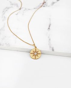 18K 14K 9K Diamond Solitaire Starburst Necklace, Polaris Star Disc Pendant Necklace, Polaris Diamond Necklace, Dainty Diamond Star Necklace, 14K 9K solid gold necklace, Minimalist neckace, Layering necklace, Gift for mom, Gift for her, Graduation Gift, FREE EXPRESS SHIPPING Dainty, minimalist solitaire diamond starburst charm necklace made in 18K, 14K or 9K gold. An absolute staple! Whisper...Shine Bright! ------------------------------------------------- D E T A I L S 18K, 14K or 9K Solid Gold Star-shaped Gold Diamond Jewelry, Gold Star-shaped Diamond Necklace, Yellow Gold Medallion Necklace With Star Charm, Fine Jewelry Yellow Gold Diamond Necklace With Star Charm, Yellow Gold Medallion Necklaces With Star Charm, Yellow Gold Diamond Necklace With Star Charm, Gold Starburst Necklace With Star Charm, Gold Starburst Fine Jewelry, Engraved Star Yellow Gold Necklace