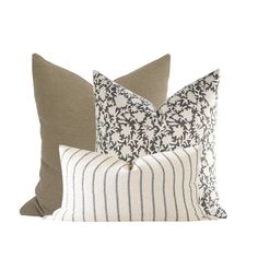 three pillows with different designs on them