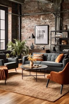 an industrial living room with brick walls and wooden floors, two couches in the center