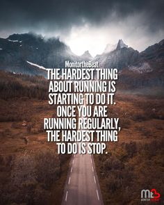 a road with mountains in the background and a quote on it that says, the hardest thing about running is starting to do