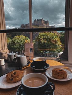 Teacups and scones on a table by a window, the view is overlooking Edinburgh Castle up on the hill on a sunny day. Voyage Europe, I Want To Travel, A Cup Of Coffee, Uk Travel