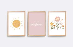 three framed art prints with flowers and the words little wildflowers in pink, yellow and