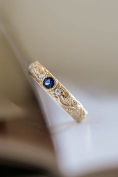 Blue sapphire wedding band, ivy leaf ring with diamonds, comfort fit ring | Eden Garden Jewelry™ Gold Ring With Sapphire, Wedding Ring With Sapphire Accents, Simple Sapphire Ring, Unique Engagement Rings For Men, Alexandrite Wedding Band, Unique Wedding Bands For Women, Elven Ring, Elven Wedding, Blue Sapphire Wedding Band