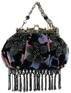 ·         This extremely rare Mary Frances Tropical Nights Shoulder Bag Crossbody is a modern play on a vintage theme. ·         Rich, printed vintage burnout velvet, in violet, black and soft rose delicately beaded with 3D black tropical flowers. ·         Tassel fringe, removable bead and chain strap fashion detail and kiss-lock brass frame with Kiss lock closure. ·         Lined interior with one slip pocket. BAG 7128 ·         Dimensions: W x D x H: 10 x 2.5 x 7" Removable Bead & Chain Strap drop: 19” We are Authorized Retailers for Mary Frances’ Stunning Pieces of Art Handbags ** GUARANTEED AUTHENTIC. ORIGINAL, NEW WITH TAGS, READY TO SHIP. All Mary Frances handbags are shipped directly to us from the manufacturer Mary Frances with manufacturer packaging & all manufacturer tags attach Mary Frances Purses, Mary Frances Handbags, Bead Flowers, Mary Frances, Burnout Velvet, Soft Rose, Pretty Bags, Vintage Theme, Bead Chain