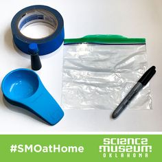 the contents of a travel kit including a measuring cup, tape and pen are shown