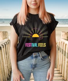 Feel the vibrant energy of summer festivals with our "Festival Feels" tee, where the sun itself grooves to the beat, adorned with colourful headphones. This shirt captures the electrifying atmosphere of music, laughter, and camaraderie that defines festival season. Whether you're dancing in the sunshine or soaking in the sounds of your favourite artists, wear it as a badge of your love for music and celebration. Let the festival vibes flow and embrace the spirit of summer in style. - 100% cotton Heavyweight Unisex Crewneck T-shirt Gildan 5000   Size guide                             SMLXL2XL3XL4XL5XL A) Length (cm)71.173.776.278.781.383.88689 B) Half Chest (cm)45.750.855.9616671.17681                             SMLXL2XL3XL 4XL   5XL A) Length (cm)71.173.776.278.781.383.88689 B) Half Chest We Are Festival, Summer Festivals, Summer Celebration, Vibrant Energy, Festival Vibes, Music Festivals, The Festival, Summer Festival, The Sunshine