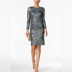 a woman is wearing a dress with sequins on it