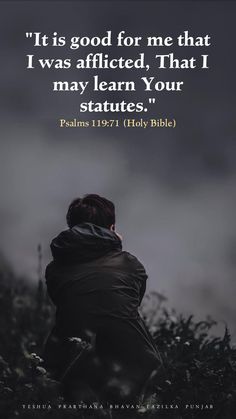 a person kneeling down in the grass with a bible quote above them that reads, it is