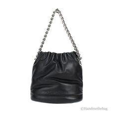 Style: Marc Jacobs Soft Small Black Shoulder Crossbody Bucket BagMaterial: Smooth LeatherFeatures: Adjustable/Detachable Crossbody Strap, Fabric Lined, Inner Snap PocketMeasures: 7.5" L x 6.75" H x 5" D Size: S.  Gender: female.  Age Group: adult. Black Pillow, Black Pillows, Marc Jacobs Bag, Black Quilt, Crossbody Strap, Cloth Bags, Smooth Leather, Marc Jacobs, Bucket Bag