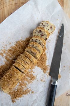 a knife and some food on a table