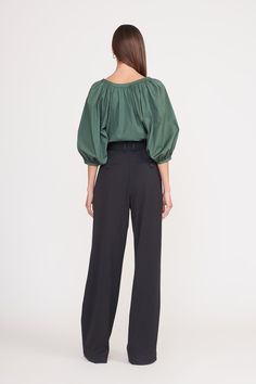 The Dill Blouse by Staud showcases a stunning deep shade of green and 3/4 puffed sleeves. This blouse can be worn year-round.  Style with wide-leg denim trousers and brown boots for the fall. Green Blouson Sleeve Blouse For Work, Green Blouse With Blouson Sleeves For Work, Green Wide Leg Pants For Formal Fall Occasions, Formal Green Wide Leg Pants For Fall, Chic Green Puff Sleeve Top, Formal Green Pants For Fall, Formal Green Fall Pants, Fall Workwear Puff Sleeve Top With Gathered Sleeves, Fall Puff Sleeve Top With Gathered Sleeves For Work