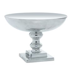 a silver bowl sitting on top of a metal stand