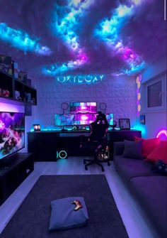 a living room filled with furniture and colorful lights on the ceiling above it's tv