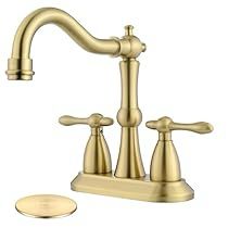 a gold faucet with two handles and nozzles