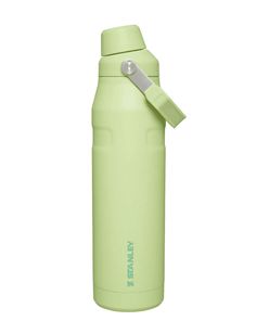 thermos bottle is green and has a silver handle on it's side