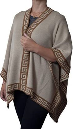 "These luxurious poncho , Shawl is woven in a luxurious Peruvian alpaca wool, unparalleled in softness and warmth. The reversible wrap is a classic with its bold geometric Inca key motif. Elegant and totally versatile, you can use it with a beautiful dress or with simple jeans; It is a necessary complement to your wardrobe. You can choose between classic and serious or cheerful and vibrant colors. Width: 39 inches (100cm) Length: 57 inches (145cm) 100% Alpaca Wool Not Blended fibers Hypoallergen Women Cape, Ladies Shawl, Poncho Women, Alpaca Poncho, Cape Wrap, Striped Shawl, Big Scarf, Knitted Shawl, Ladies Poncho