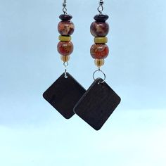 Multicolor Wooden Beads Dangle Earrings, Multicolor Dangle Beaded Earrings With Wooden Beads, Adjustable Brown Beaded Earrings With Large Beads, Wooden Beads Drop Earrings, Wooden Beads Round Beaded Earrings As Gift, Gift Wooden Beaded Round Earrings, Wooden Beads Dangle Earrings, Gift Wooden Beaded Earrings, Brown Wooden Bead Drop Earrings