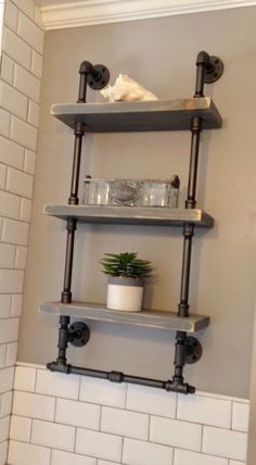 a bathroom with two shelves on the wall