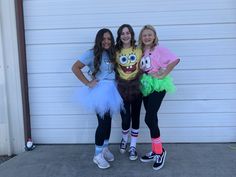 three girls dressed up as characters from the spongebob movie posing in front of a garage door