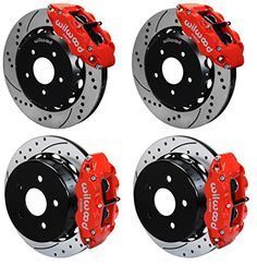 three red brake discs and rotors on the front of a white background with text