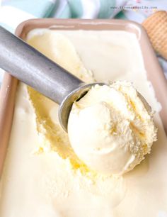 a scoop of vanilla ice cream in a pan