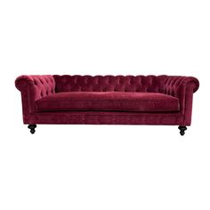 a red velvet couch with black legs and buttons on the back, against a white background